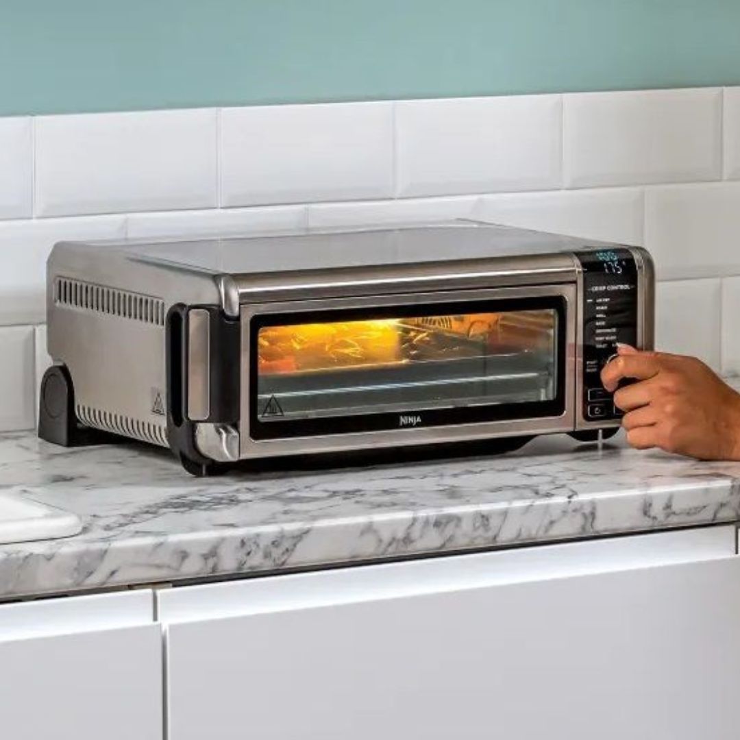 Мини фурна Ninja Foodi 8 в 1 SP101EU, Мощност 2400W, 8 функции, 6 инфрачервени нагревателя, Цифровият дисплей, Таймерът, Вътрешно осветление, Сребрист 4 Мини фурна Ninja Foodi 8 в 1 SP101EU, Мощност 2400W, 8 функции, 6 инфрачервени нагревателя, Цифровият дисплей, Таймерът, Вътрешно осветление, Сребрист - Image 4