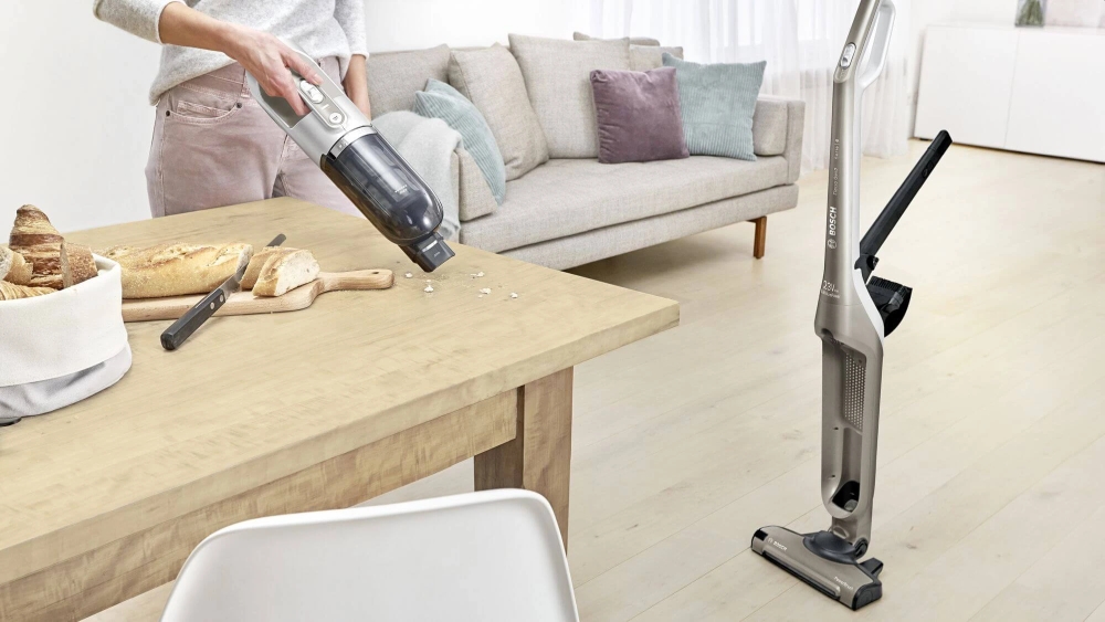 Вертикална прахосмукачка Bosch BBH3ALL23 Flexxo, Безжична, Батерия 21.6 V до 50 мин., 2 нива на мощност, Контейнер 0,4 л, Моторизирана четка с LED светлини, Вградени аксесоари, Кафяв 3 Вертикална прахосмукачка Bosch BBH3ALL23 Flexxo, Безжична, Батерия 21.6 V до 50 мин., 2 нива на мощност, Контейнер 0,4 л, Моторизирана четка с LED светлини, Вградени аксесоари, Кафяв - Image 3